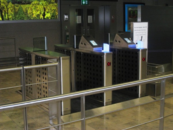 FIGURE 5BA closer look on the two E-gates tested at gate A67, where the boarding card scanner is located on the right of each area