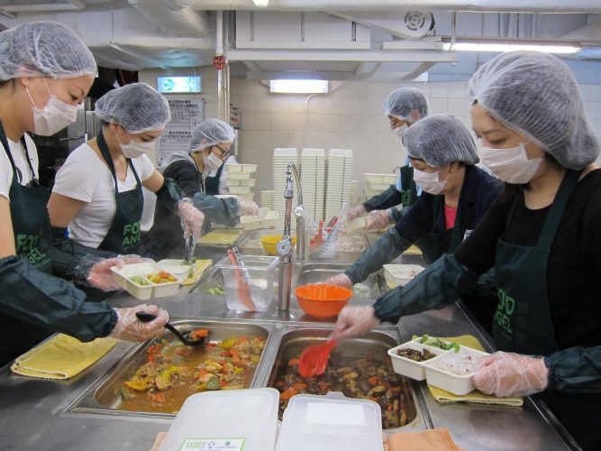 Preparing meals at Food Angel's community kitchen