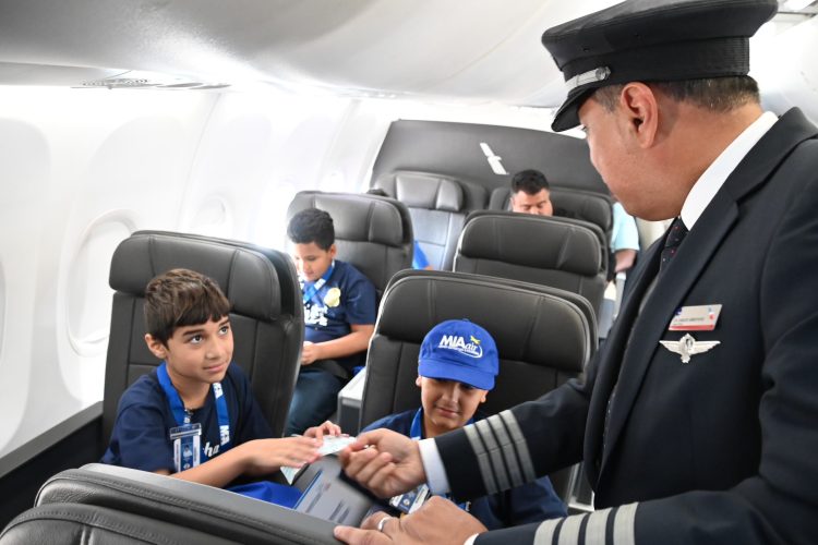 MIAair tour participants meet an American Airlines flight captain.