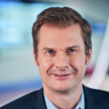 Frankfurt Airport discusses the implementation of walkthrough scanners for passenger security checks, enhancing comfort and efficiency by allowing travellers to pass through at a normal pace.