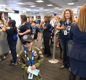 MIAair tour participants prepare to board an American Airlines aircraft.