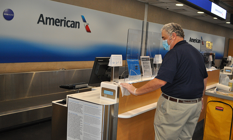 Albany Airport staff cleaning touchpoint