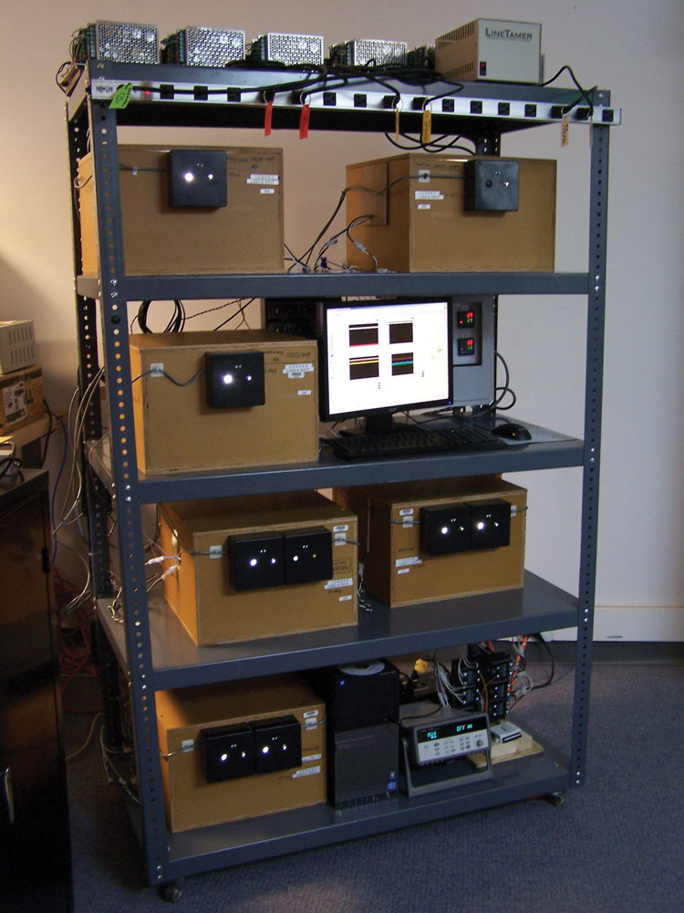 Test rack with the six LED luminaire samples under long-term life test. 