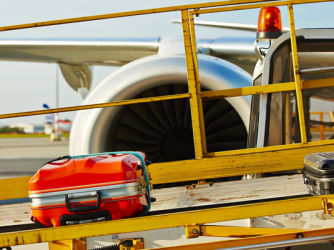 Baggage on conveyor belt to aircraft