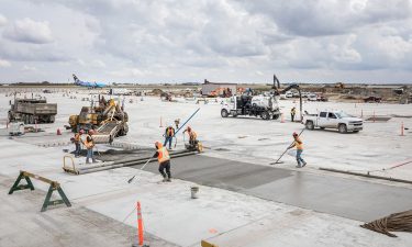 Construction of the new low-carbon apron at Calgary International Airport