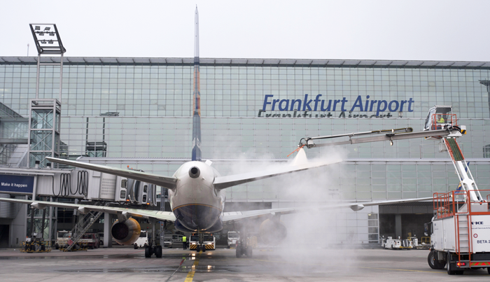 Winter operations: de-icing a plane at Frankfurt International Airport