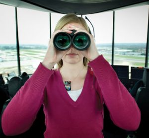 Using binoculars in an air traffic control tower