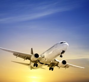 Boeing 737 landing at sunset